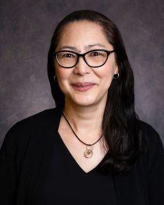 Headshot of a woman.