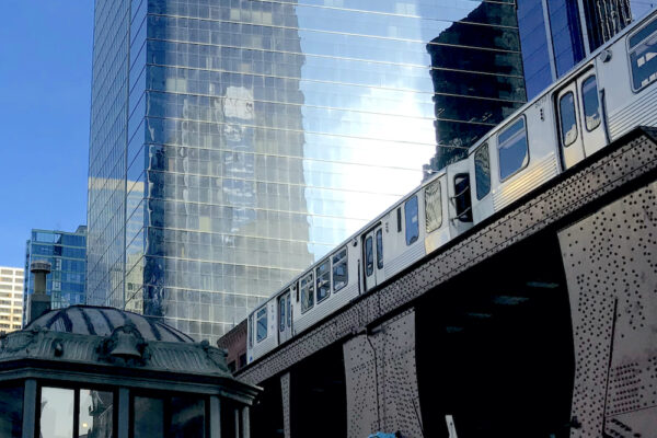 Chicago Transit Authority railcar on elevated tracks